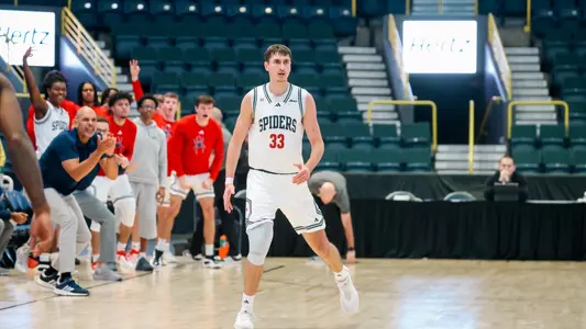 Apostolos Roumoglou gets back on defense after a three-pointer