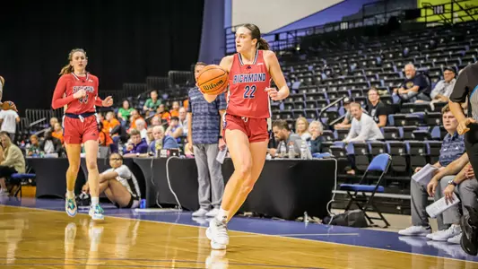 Rachel Ullstrom dribbling against Oakland