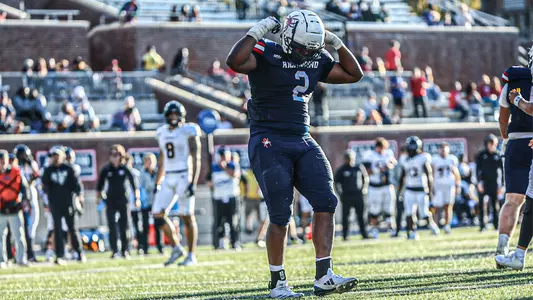 Jeremiah Grant celebrates a sack during Richmond's 34-25 win over Towson