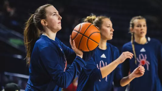 Maggie Doogan Shooting during warmups