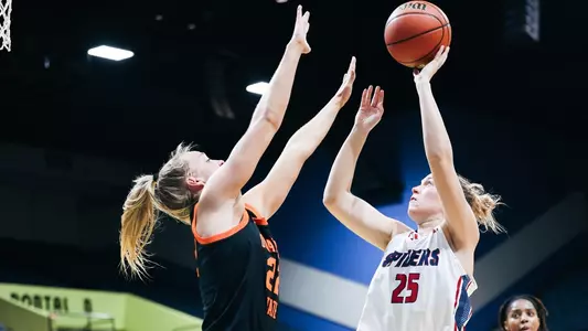 Katie Hill shooting over an OSU girl