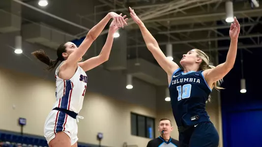 Ullstrom Shooting over a Columbia Player