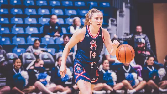 Ally Sweeney Dribbling the ball down the court