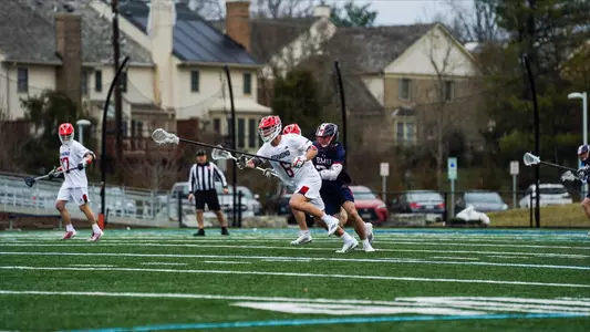 Hunter Smith carries the ball upfield during Richmond 23-7 win over Robert Morris Saturday, Feb. 10, 2023