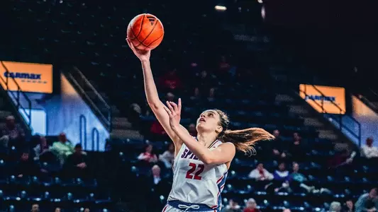 Rachel Ullstrom Netting a layup vs George Washington