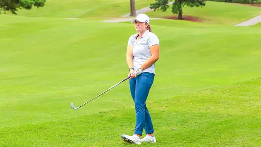 Rory Weinfurther watches her approach to the green at Westhampton Country Club