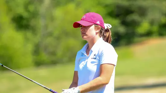 Rory Weinfurther eyes her approach shot to the green over her outstretched club