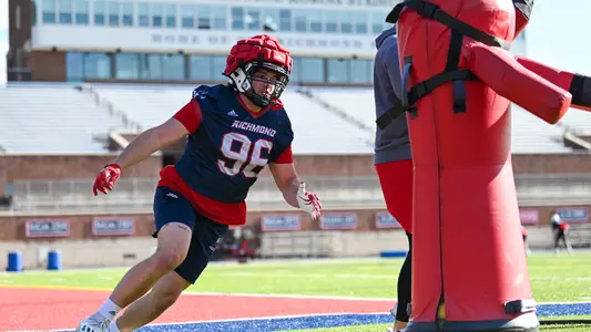 Camden Byrd approaches a tackling dummy during a spring football practice held in March of 2023