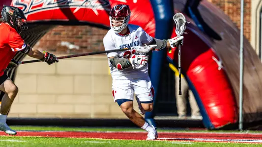 Dalton Young evades a defender during Richmond's 12-11 double overtime loss to No. 6 Maryland Feb. 3, 2024