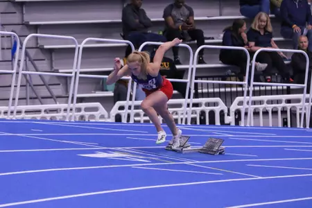 Elke Van der Westhuizen exploding off the blocks during 200m dash trials at the 2024 Atlantic 10 Indoor Track and Field Championships in Virginia Beach, Va.
