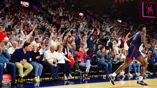 Spider fans celebrate after Richmond makes a shot vs Dayton on Jan. 27, 2024
