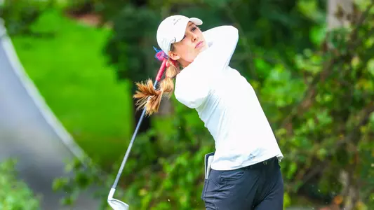 Olivia Wilkie holds her follow-through following her tee shot