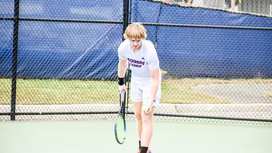 Paxton Pritchard about to serve the tennis ball \