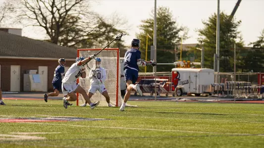 Luke Grayum takes a shot during Richmond's 17-5 win over Bucknell Tuesday, March 12, 2024