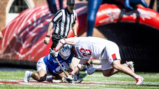 Jared Chenoy takes a face off during Richmond's 12-3 loss to Richmond on Saturday March 16, 2024