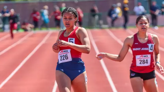 Nina Lavelle Crossing the Finish Line at the 2023 outdoor conference championships