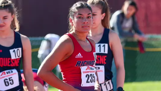 Manon Stephen looking at the camera, getting ready to race in the 2023 outdoor conference championships