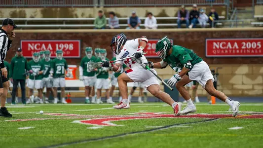 Jared Chenoy win a face off during Richmond's 19-10 victory over Binghamton