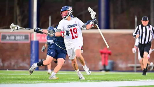 Jack Pilling carries the ball during Richmond's 14-10 loss to Georgetown on March 23, 2024