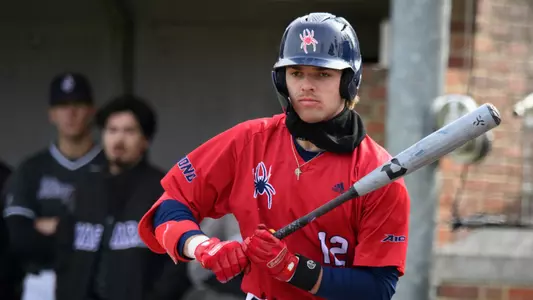 Jack Arcamone prepares for the next pitch at the plate