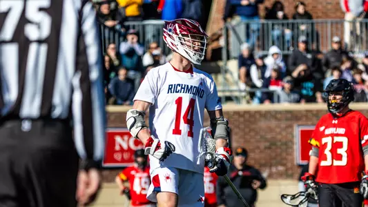 Luke Grayum celebrates a goal during Richmond's season opener against Maryland on Feb. 29, 2023