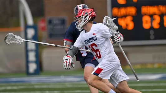 Jack Ricciardi works past a defender during Richmond's 23-7 win over Robert Morris, Feb. 10, 2024