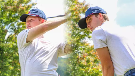 Cole Ekert and Jack LaPiana each line up their tee shots on a par 3