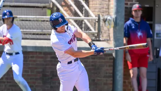 Jake Topolski swings at the pitch.