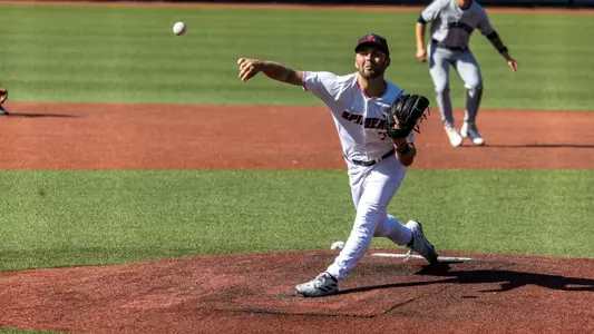 Jackson Kraemer releases the ball towards home
