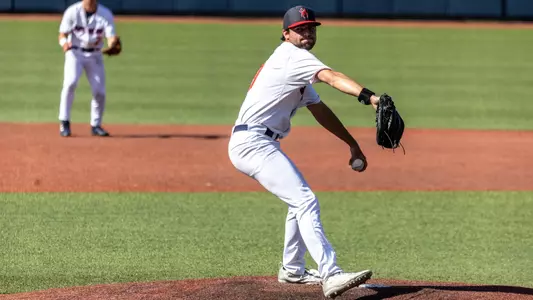 Harrison Clifton throws the ball towards home plate