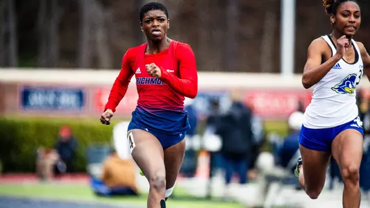 Alicia Dawson running straight on, looking ahead