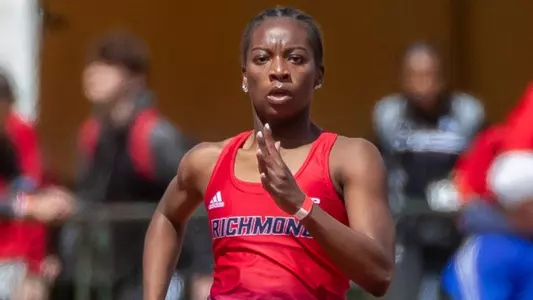 Close up of Gabrielle Cummings running a sprinting event