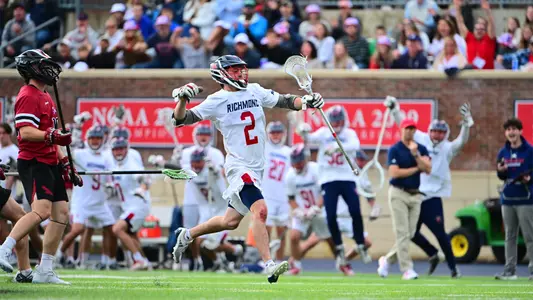 Lance Madonna fist pumps after scoring a goal during Richmond's game against Saint Joseph's on April 27, 2024