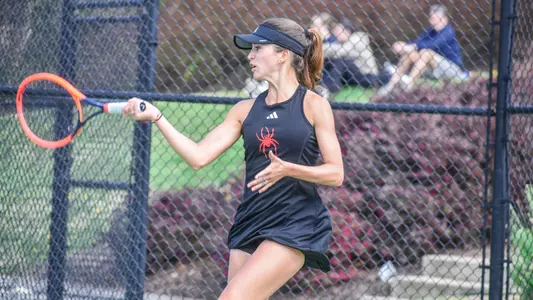 andrea campodonico hitting a tennis ball