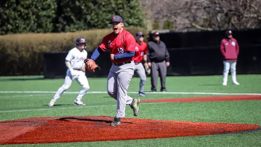 Cole Hentschel screams in celebration of closing out the game to seal the victory.