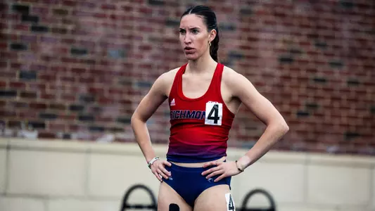 Caroline Donohoe with her hands on waist preparing to race in an event