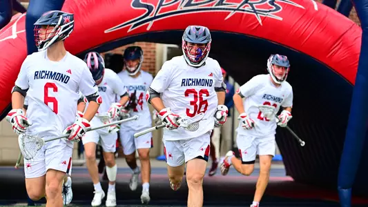Joe Gooley runs out of the tunnel during Richmond's game against Saint Joseph's on April 27, 2024
