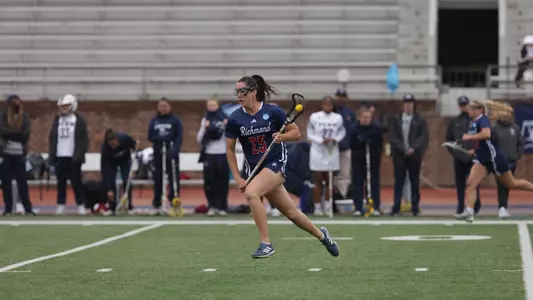 Maggie Jordan carries the ball upfield during a clear attempt at Franklin Field during Richmond's First Round NCAA Tournament game on May 10, 2024