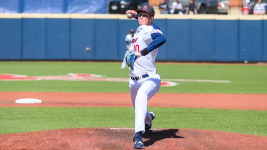 Logan Ymker strides towards the plate and throws the ball