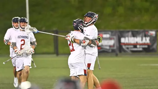 Dalton Young and Lukas Olsson embrace during the semifinals of the 2024 Atlantic 10 championships