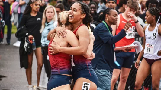 Ginny Beringer hugging a teammate