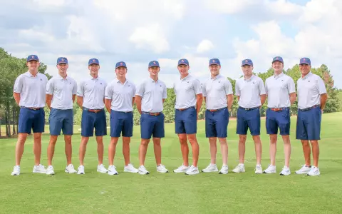 Members of the 2023-24 Richmond men's golf team pose on the tee box