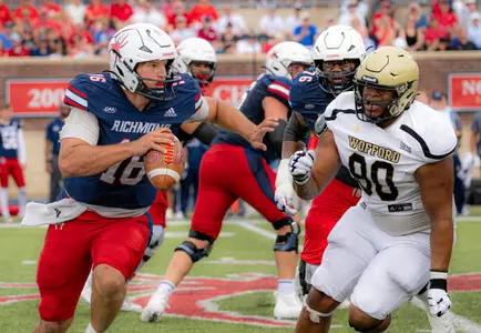 Kyle Wickersham evades a Wofford defender during Richmond's home opener loss to the Terriers on Sept. 7, 2024
