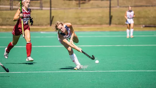 Spider field hockey's Avery Russell passes the ball