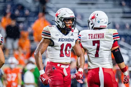 Quantraill Morris-Walker celebrates a tackle against Virginia on Aug. 31, 2024