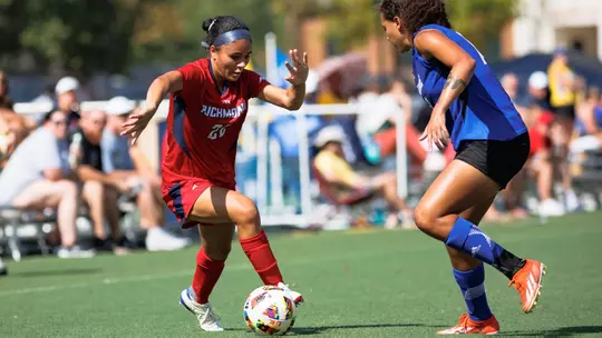 JoJo McShane dribbling past a Delaware defender