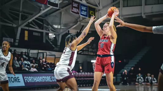Addie Budnik looking for an open player vs Fordham