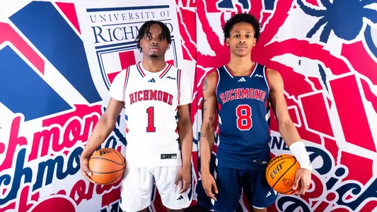 Mikkel Tyne and B. Artis White wearing throwback uniforms