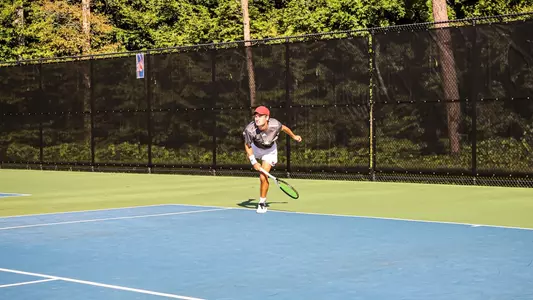 Dylan Atkinson serving the ball