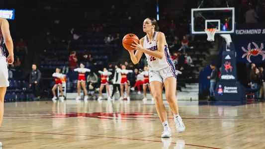 Rachel Ullstrom shooting a three pointer